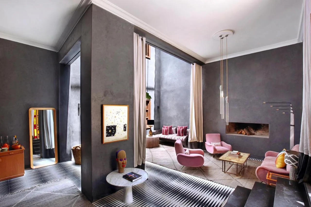 Room with a fireplace — El Fenn