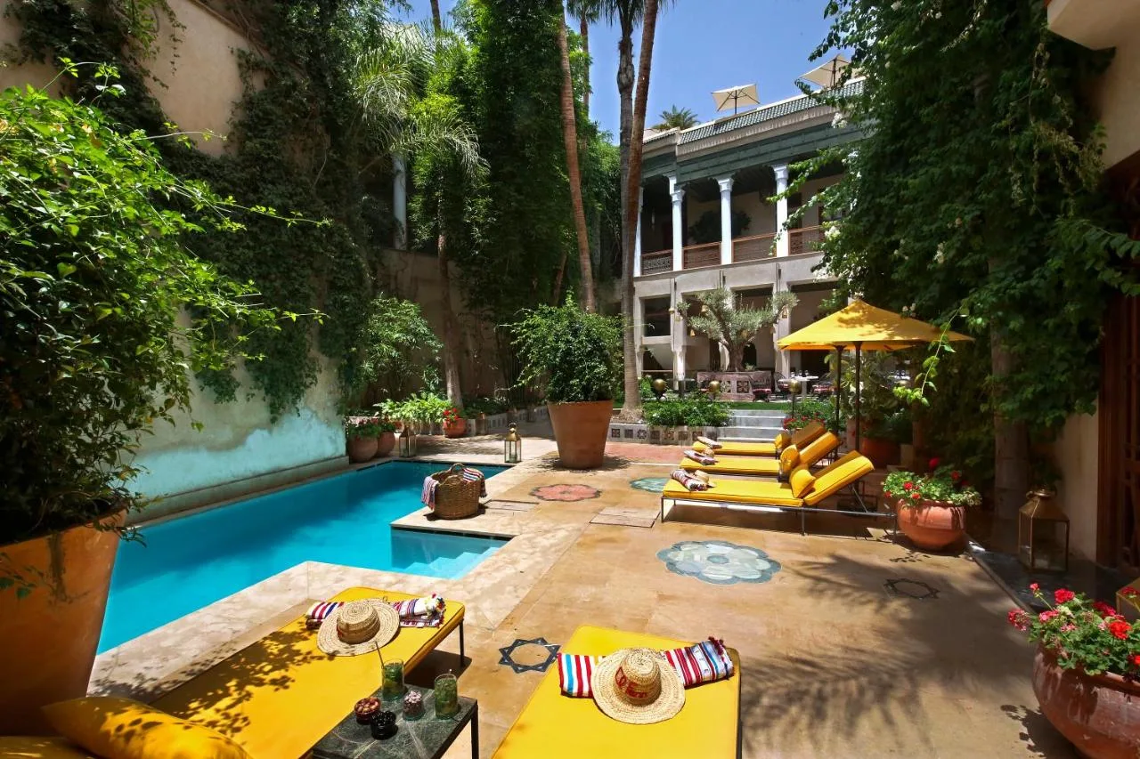 Patio with a pool — El Fenn