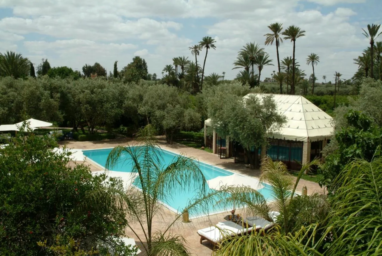 Piscina nel giardino — La Maison Arabe