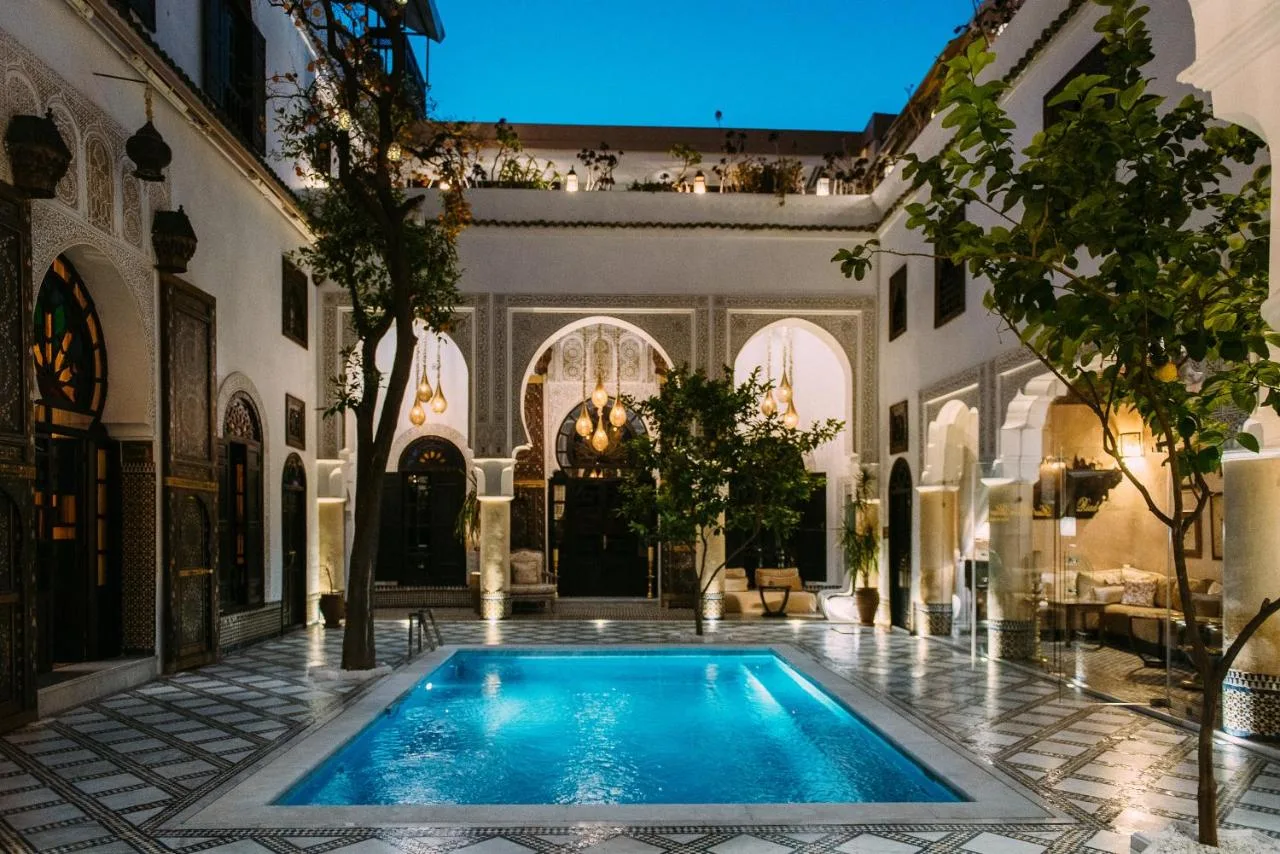 Pool at night — Riad Maison Bleue and Spa